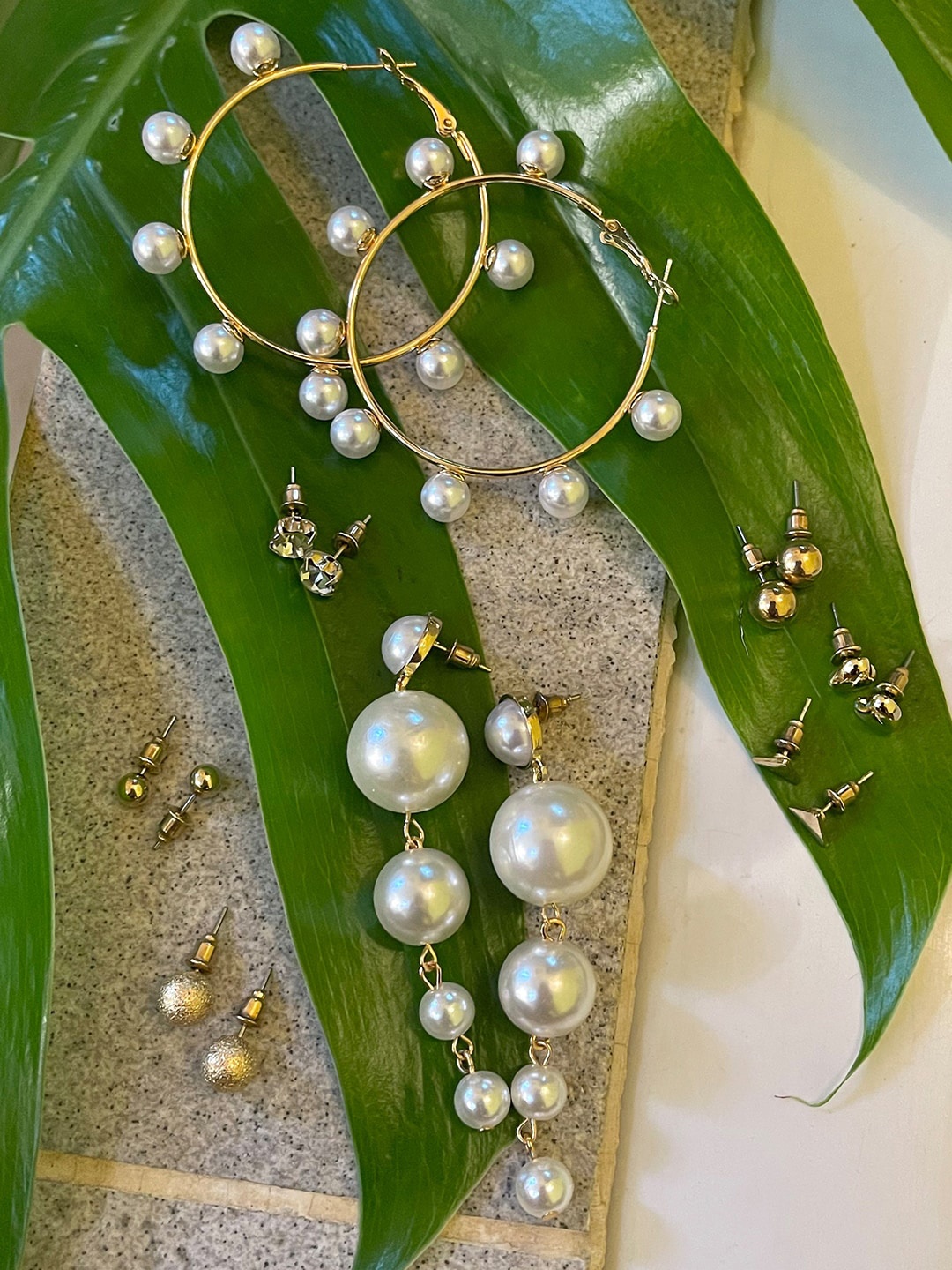 

Ayesha Women Gold-Toned & White Contemporary Drop Earrings