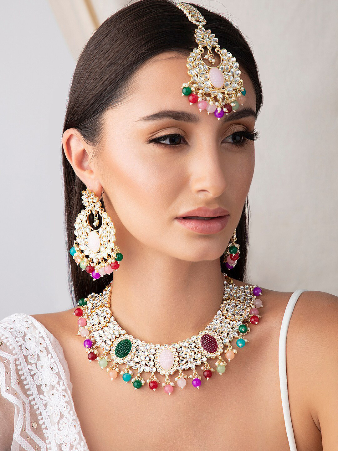 

Rubans Gold-Plated White & Pink Kundan Studded Beaded Jewellery Set