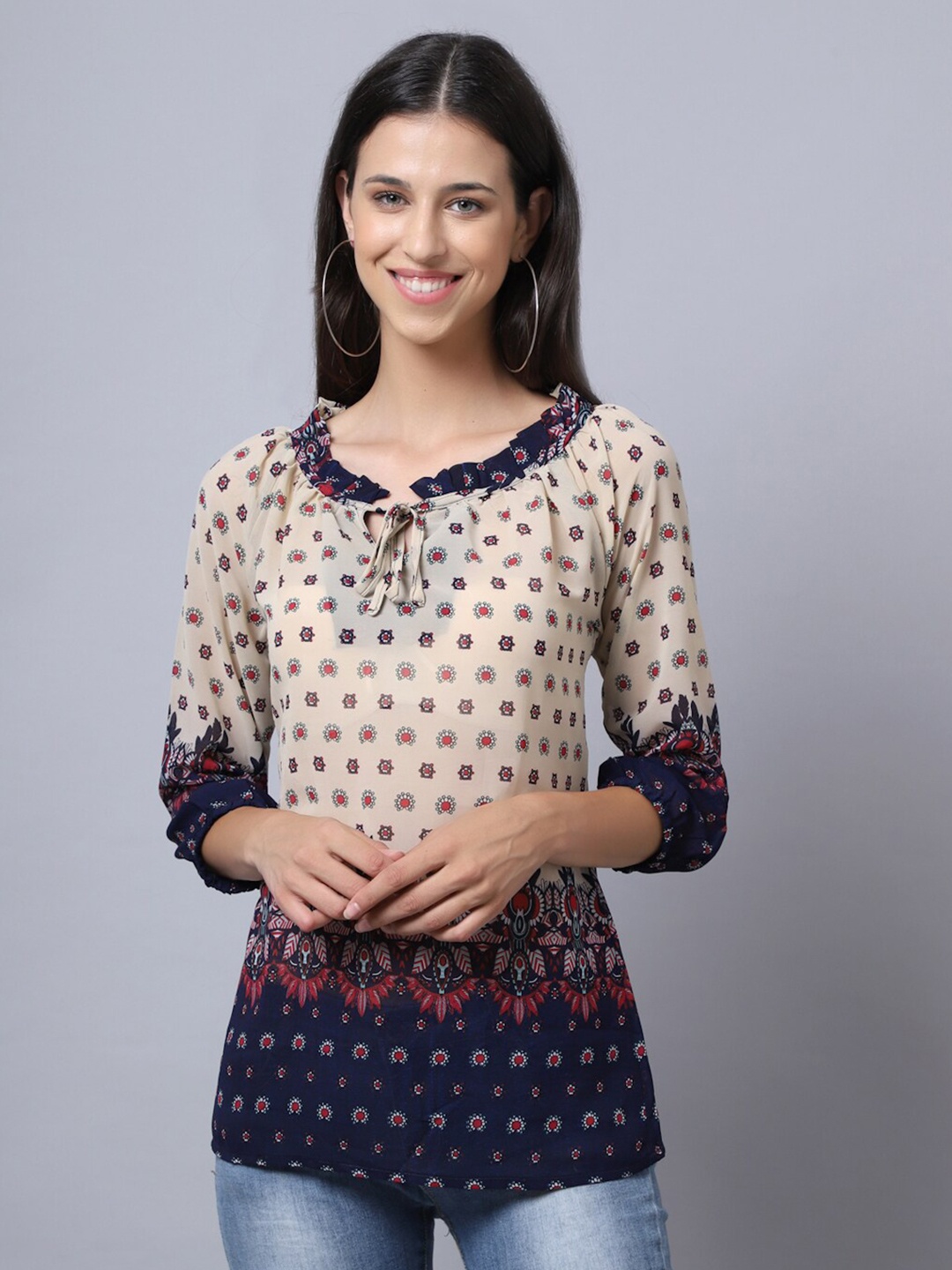 

Rute Cream-Coloured & Navy Blue Printed Tie-Up Neck Longline Top