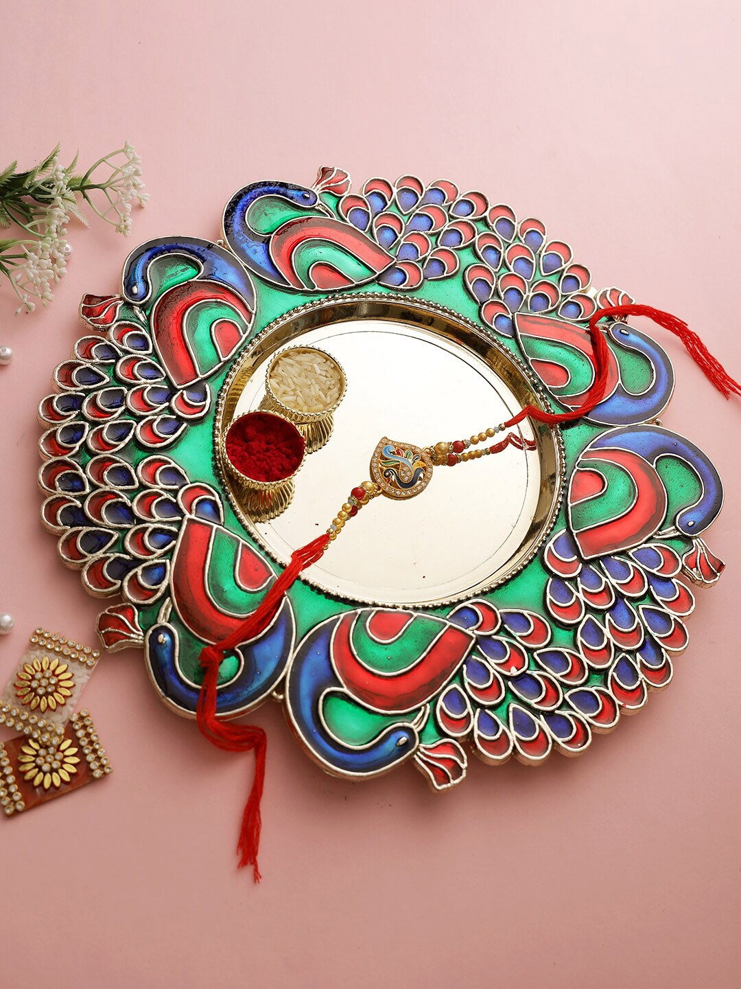 

Aapno Rajasthan Red Rakhi with Peacock Design Pooja Plate