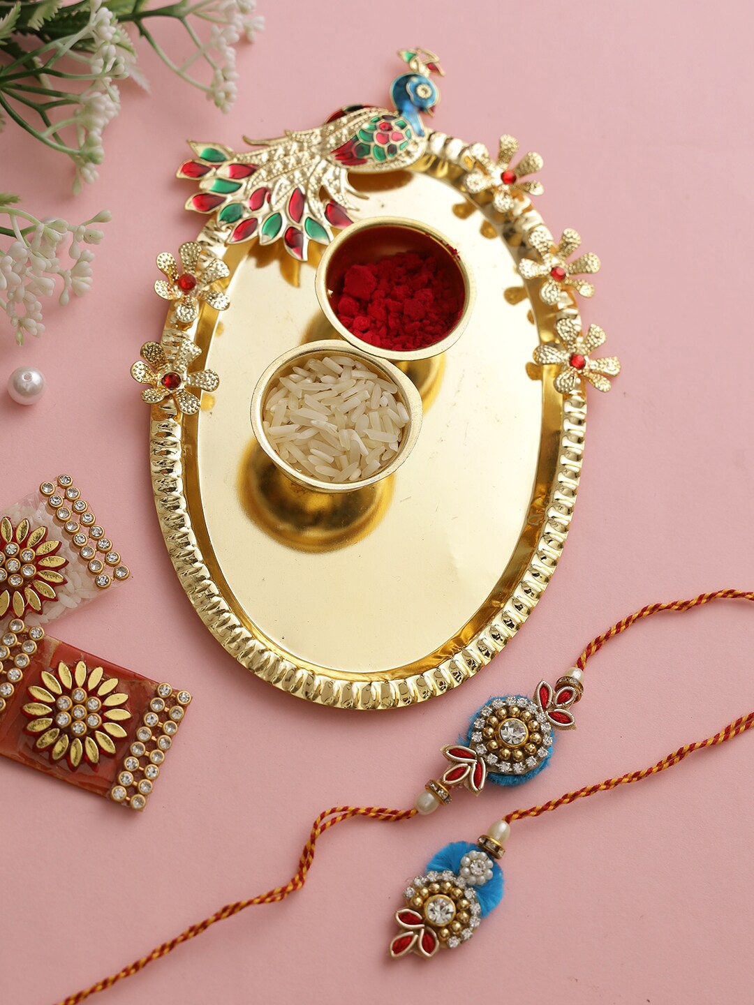 

Aapno Rajasthan Red & Gold-Toned Peacock Rakhi Gift Set