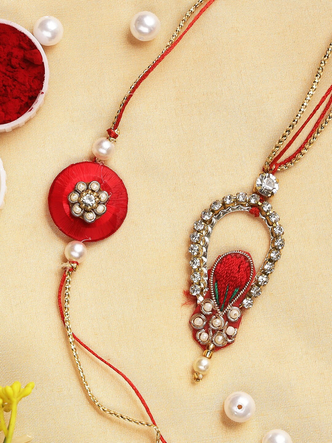 

Aapno Rajasthan Red & Silver-Toned Peacock Bhaiya Bhabhi Rakhi Gift Set