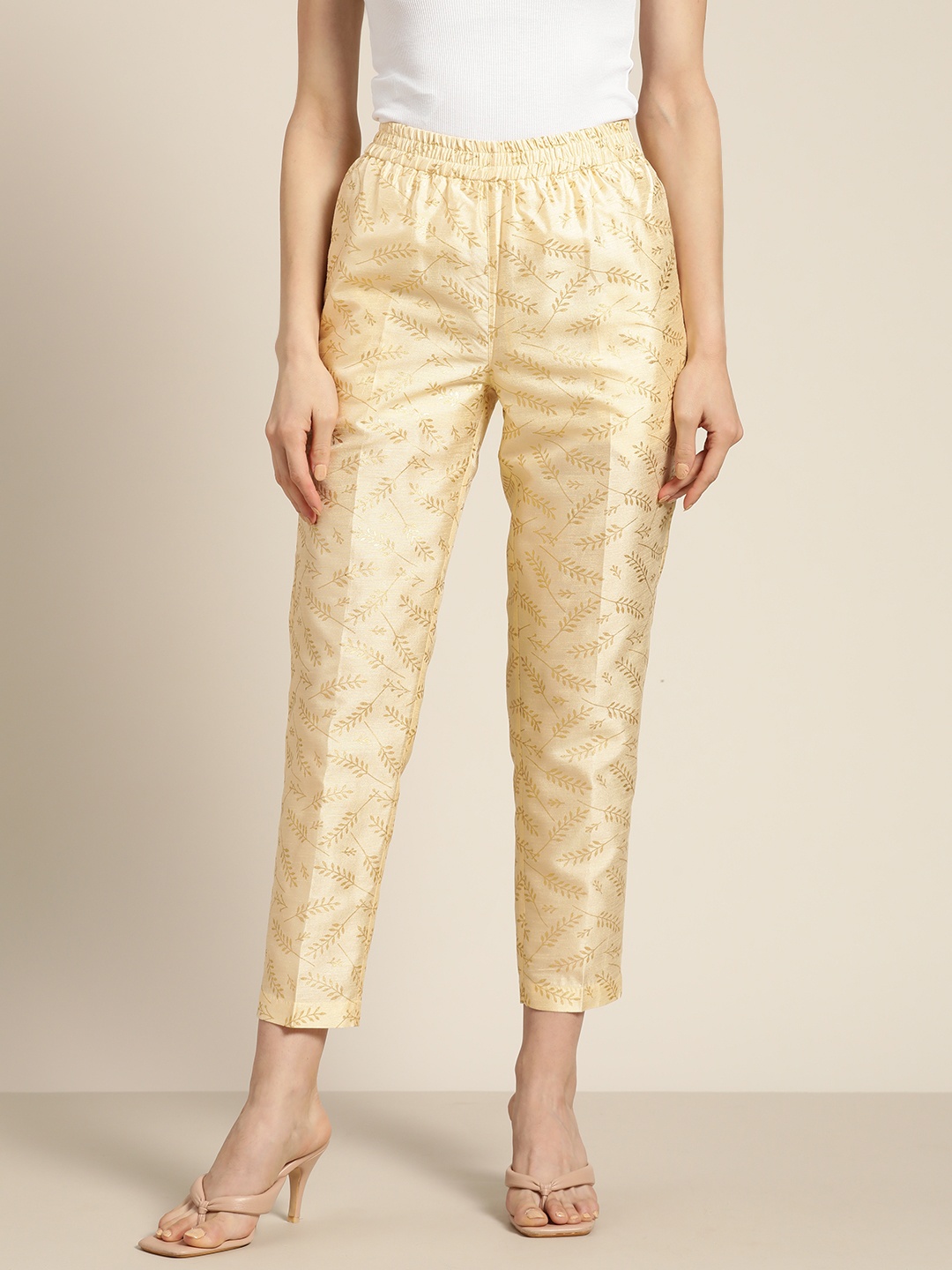 

Shae by SASSAFRAS Women Beige Floral Printed Trousers