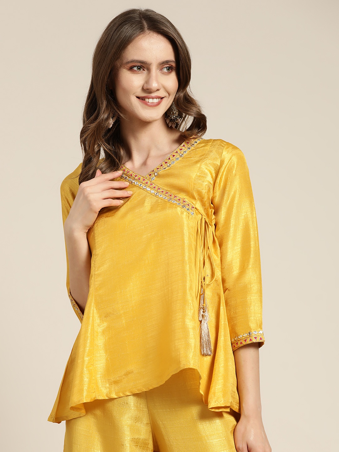 

Shae by SASSAFRAS Mustard Yellow Embellished Embroidered Wrap Top