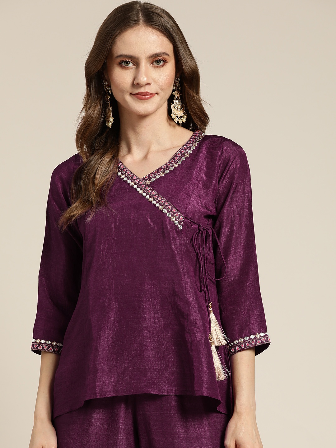 

Shae by SASSAFRAS Burgundy Geometric Embroidered Wrap Top