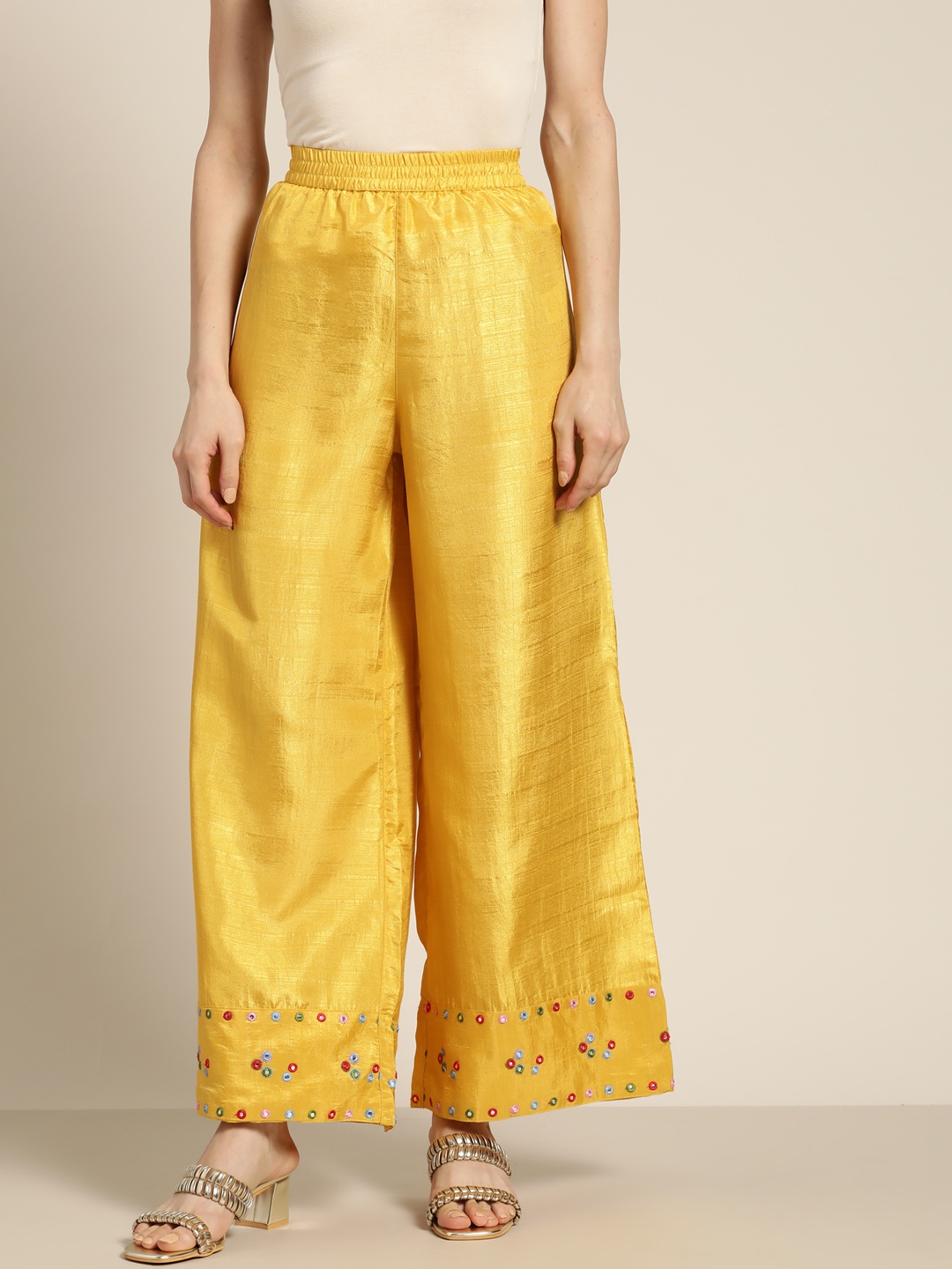 

Shae by SASSAFRAS Women Mustard Yellow Hem Design Mirror Work Flared Ethnic Palazzos