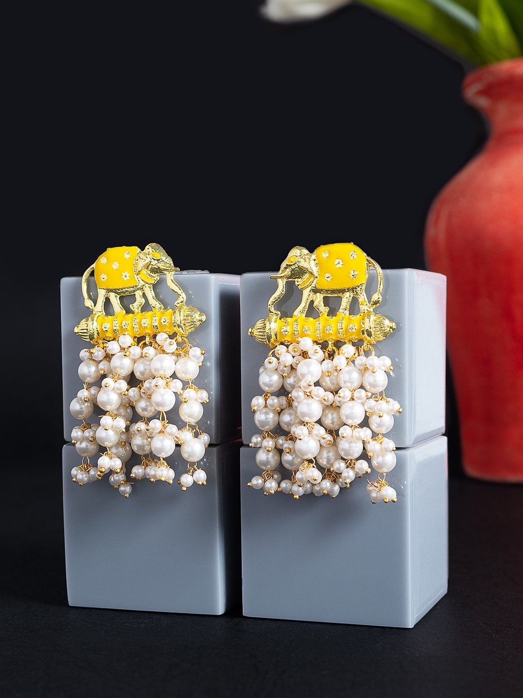 

Golden Peacock Yellow & White Animal Shaped Drop Earrings