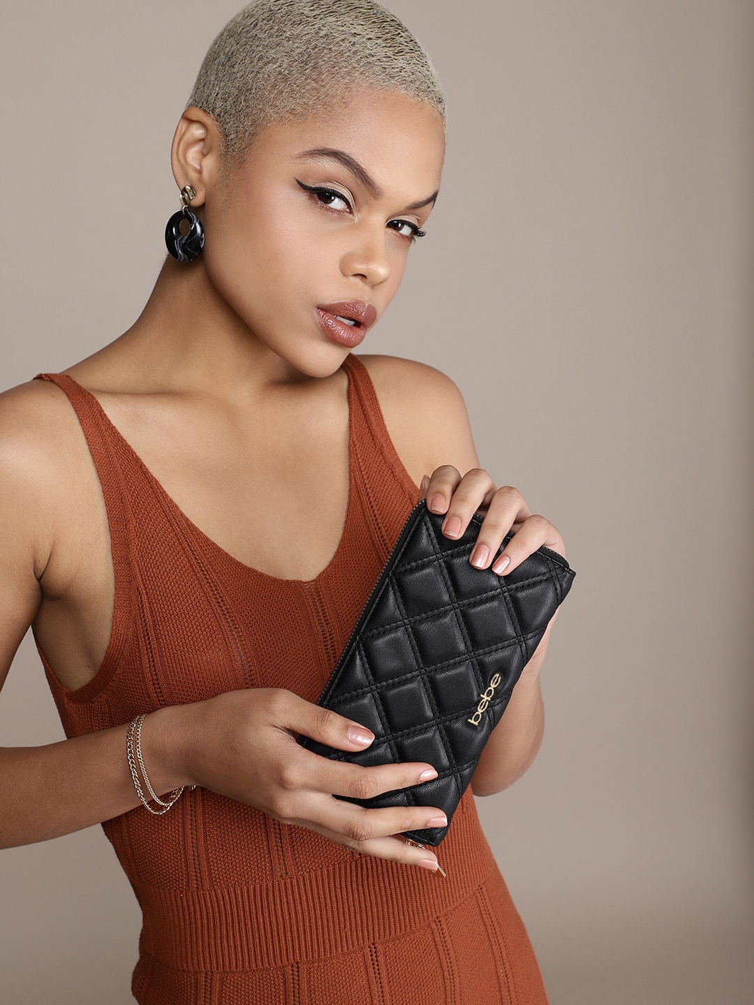 

bebe Women Quilted Zip Around Wallet, Black