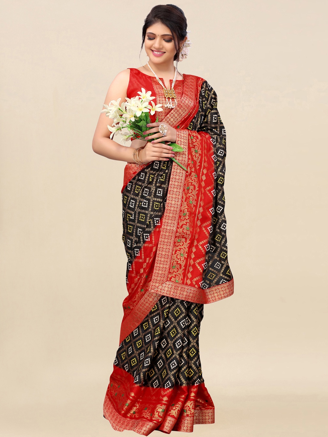 

Satrani Black & Orange Silk Blend Bandhani Saree