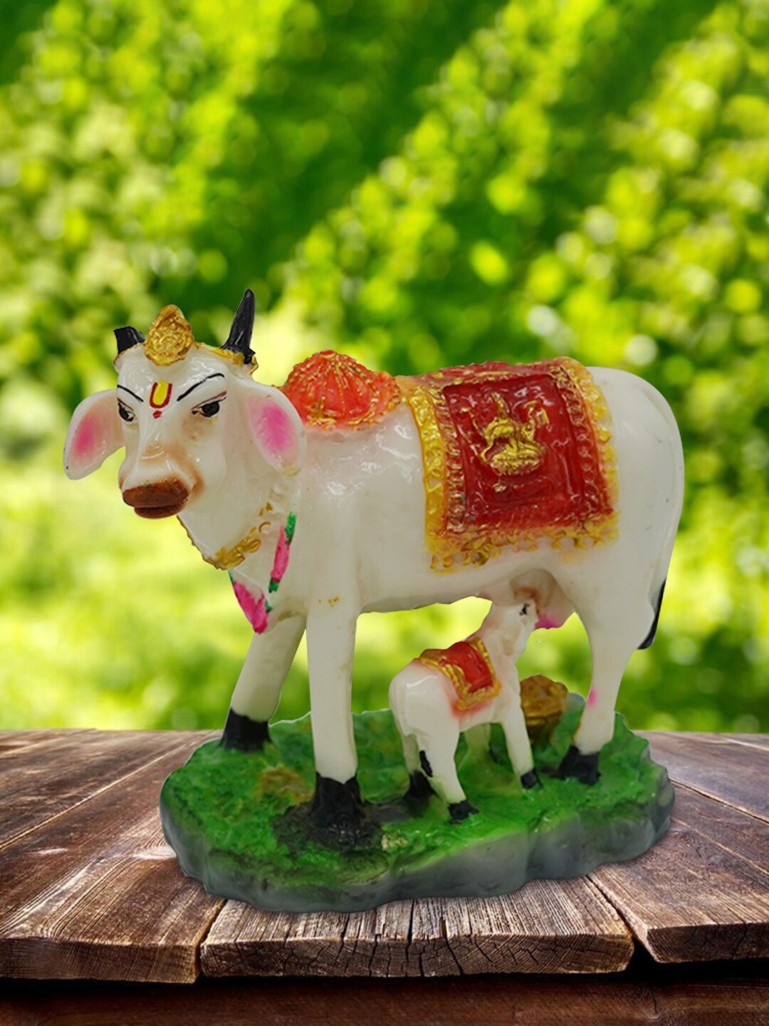 

Gallery99 White & Pink Nandi Idol with Their Puppies Showpieces