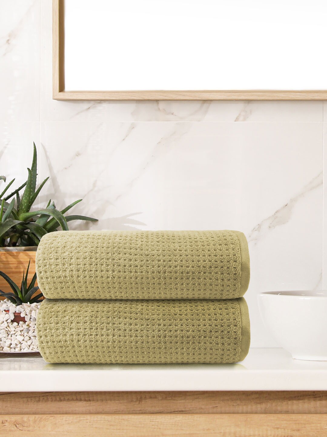 

Trident Pack Of 2 Beige Solid 500 GSM Cotton Bath Towels