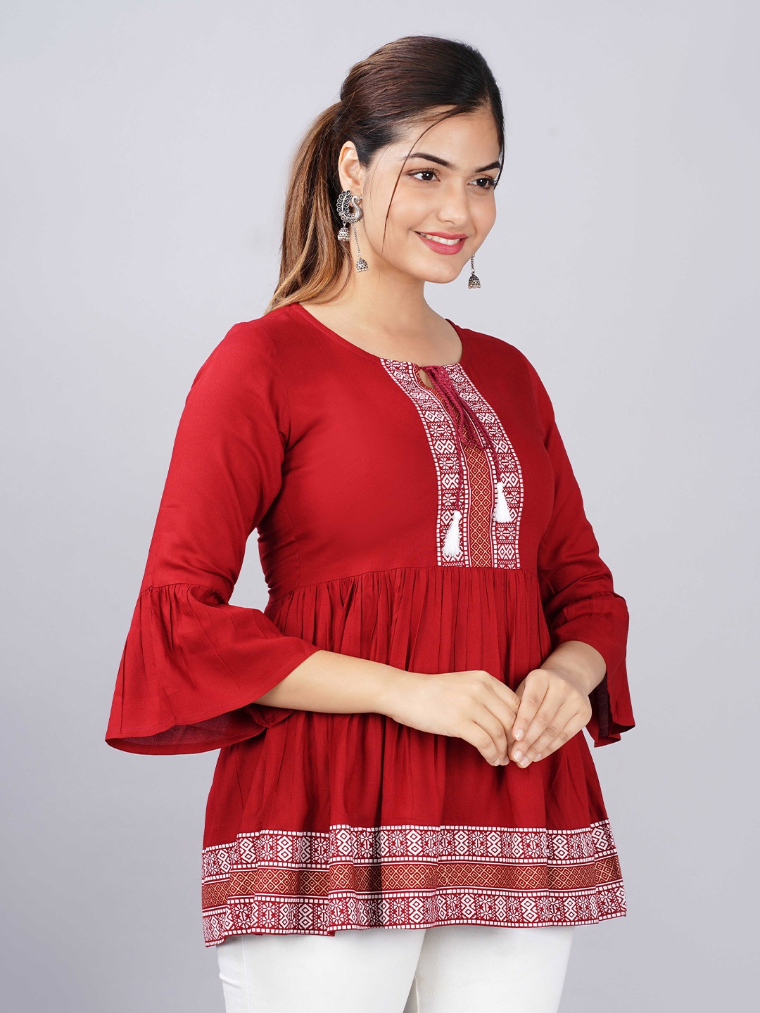 

CHRISTEENA Maroon Geometric Print Tie-Up Neck Empire Top
