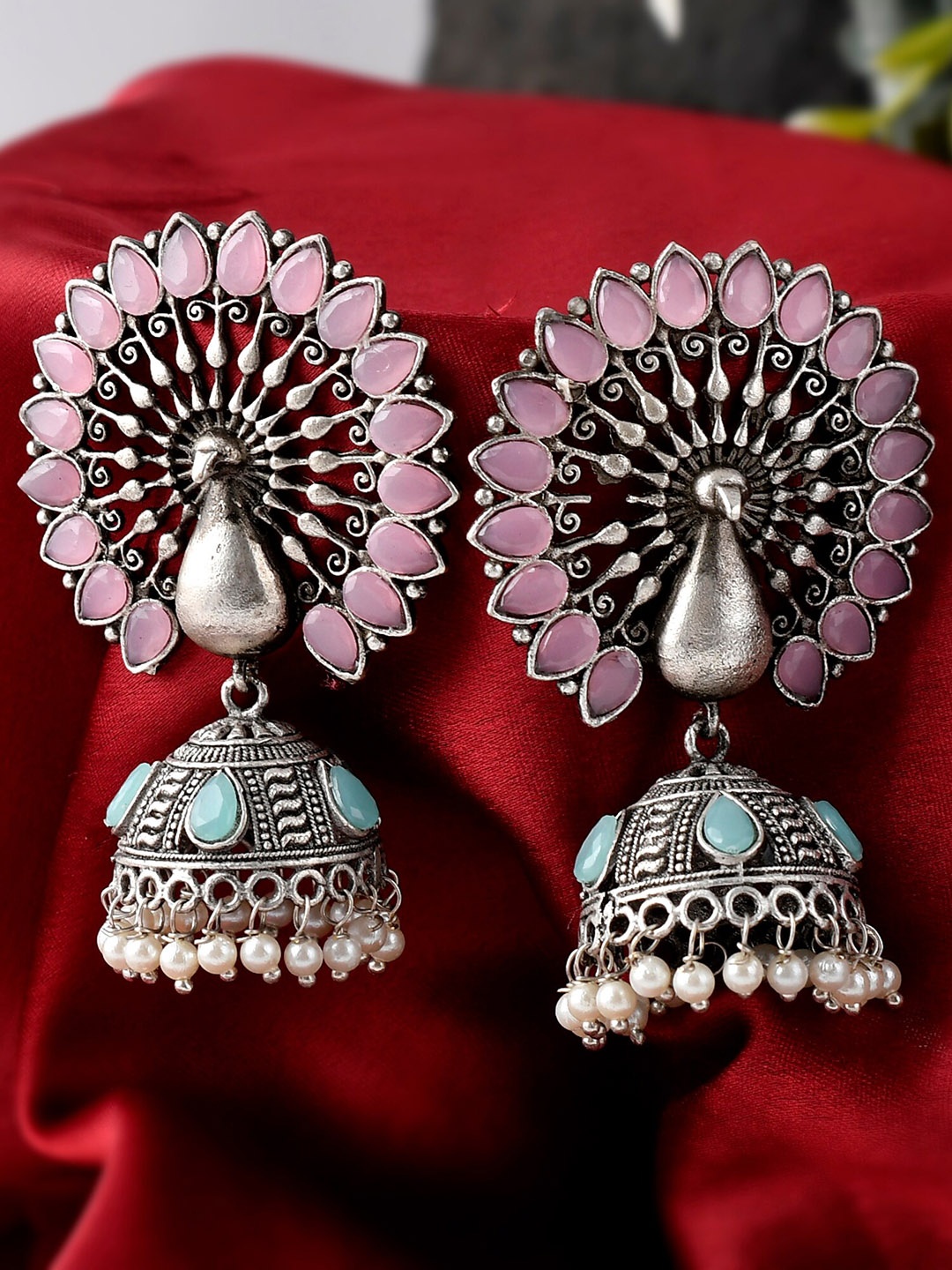 

DASTOOR Silver-Toned Peacock Shaped Jhumkas Earrings