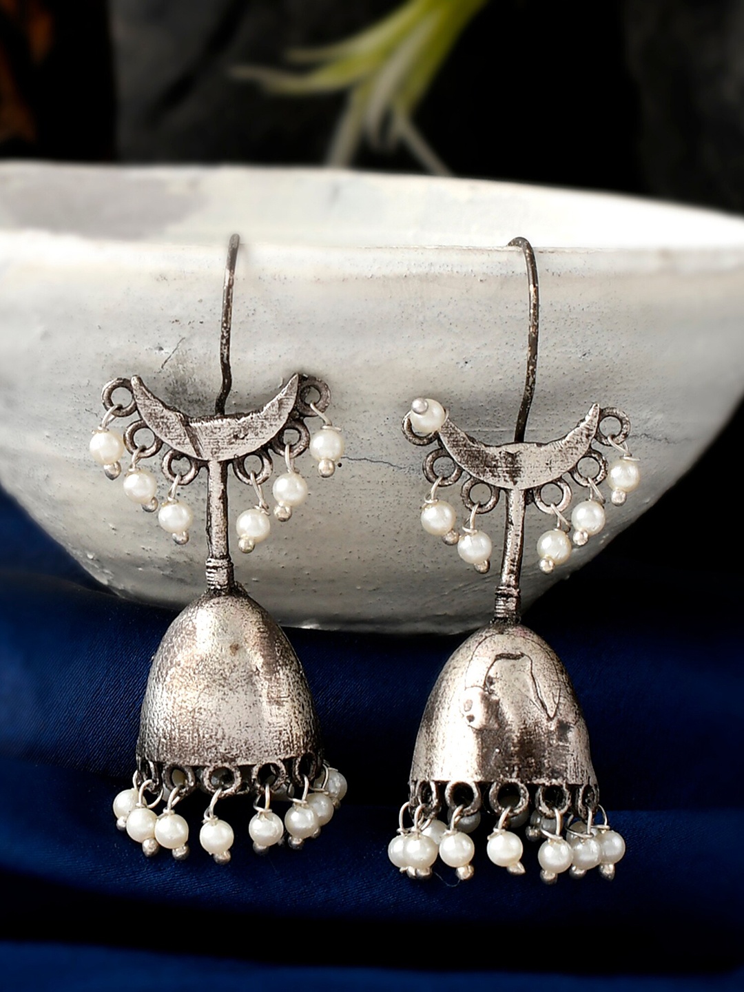 

DASTOOR Silver-Toned Contemporary Jhumkas Earrings