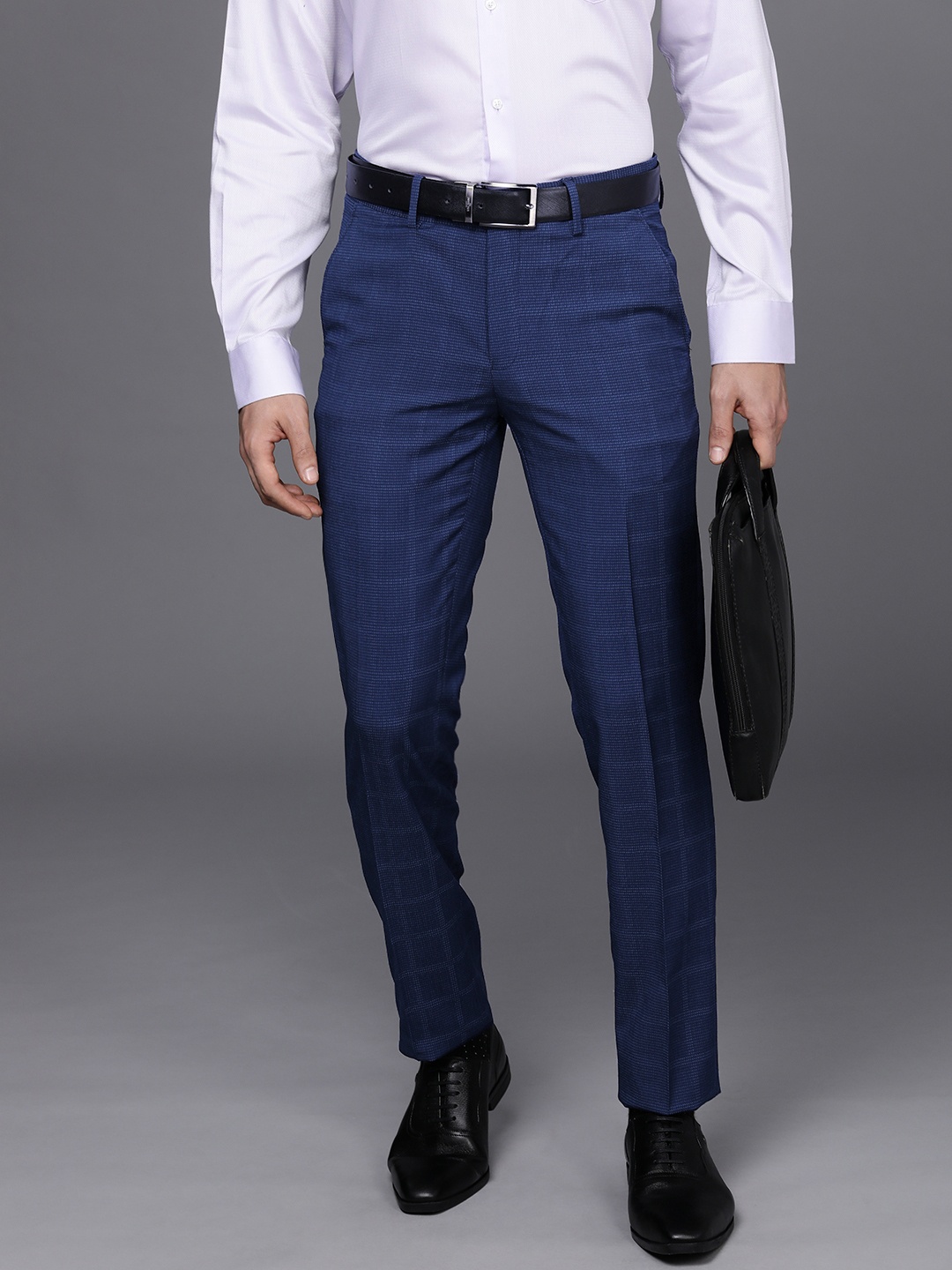 

Peter England Elite Men Blue Checked Slim Fit Trousers