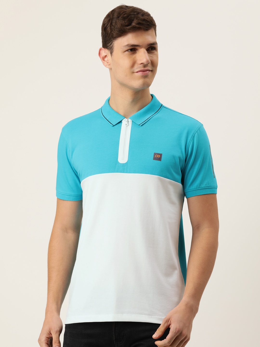 

Peter England Men White & Blue Colourblocked Polo Collar T-shirt