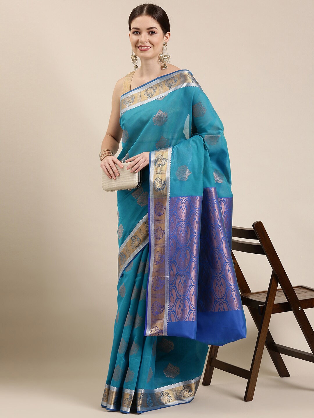 

The Chennai Silks Blue & Gold-Toned Ethnic Motifs Zari Silk Cotton Fusion Maheshwari Saree