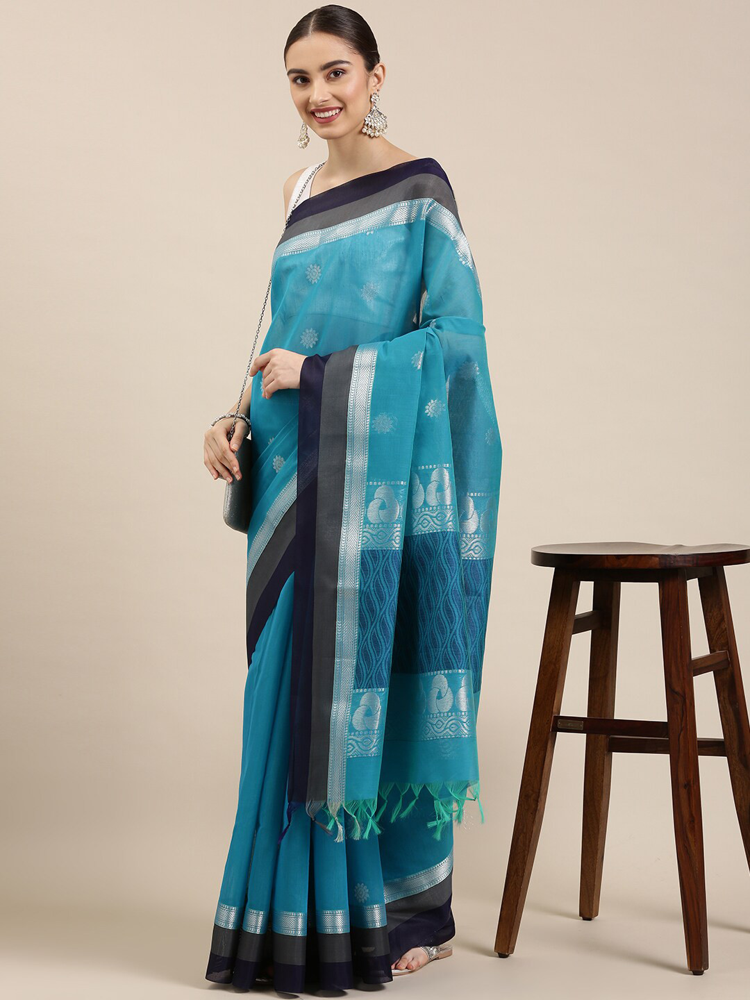 

The Chennai Silks Blue & Silver-Toned Ethnic Motifs Zari Silk Cotton Maheshwari Saree