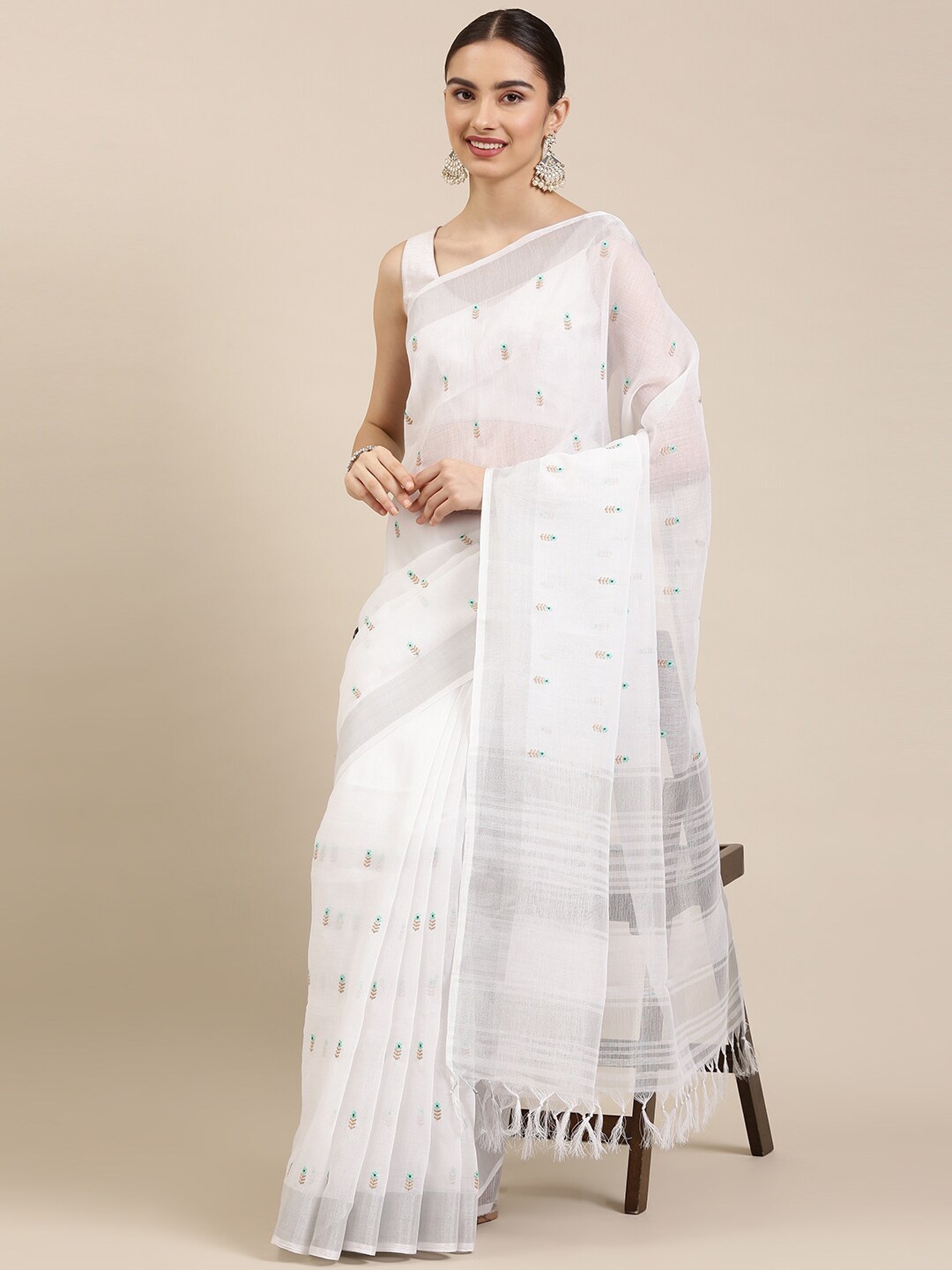 

The Chennai Silks White & Silver-Toned Ethnic Motifs Embroidered Linen Blend Saree