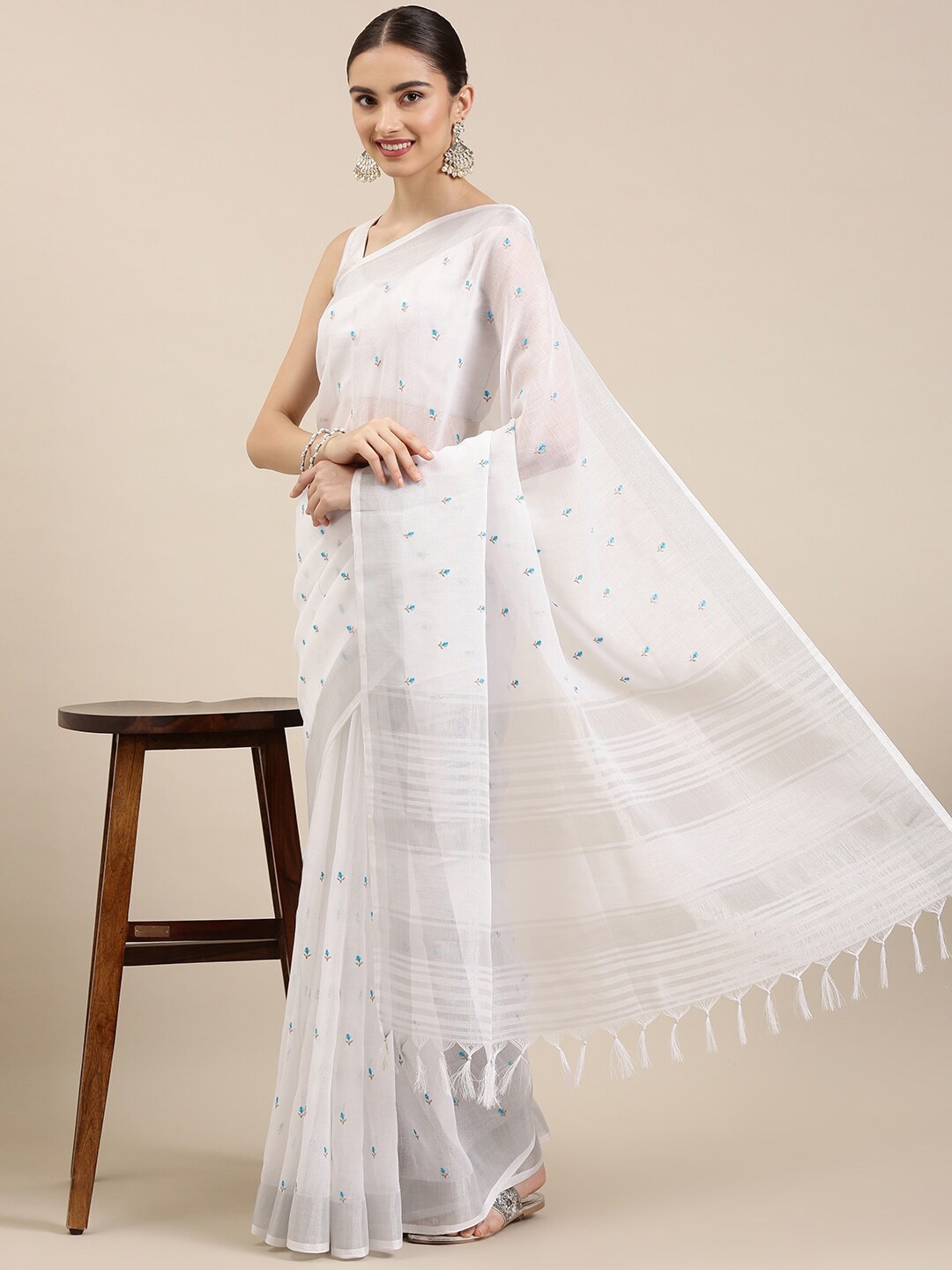 

The Chennai Silks White & Blue Floral Embroidered Linen Blend Saree