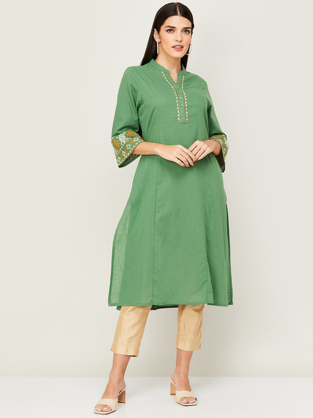 

Melange by Lifestyle Women Green Yoke Design Flared Sleeves Thread Work Kurta