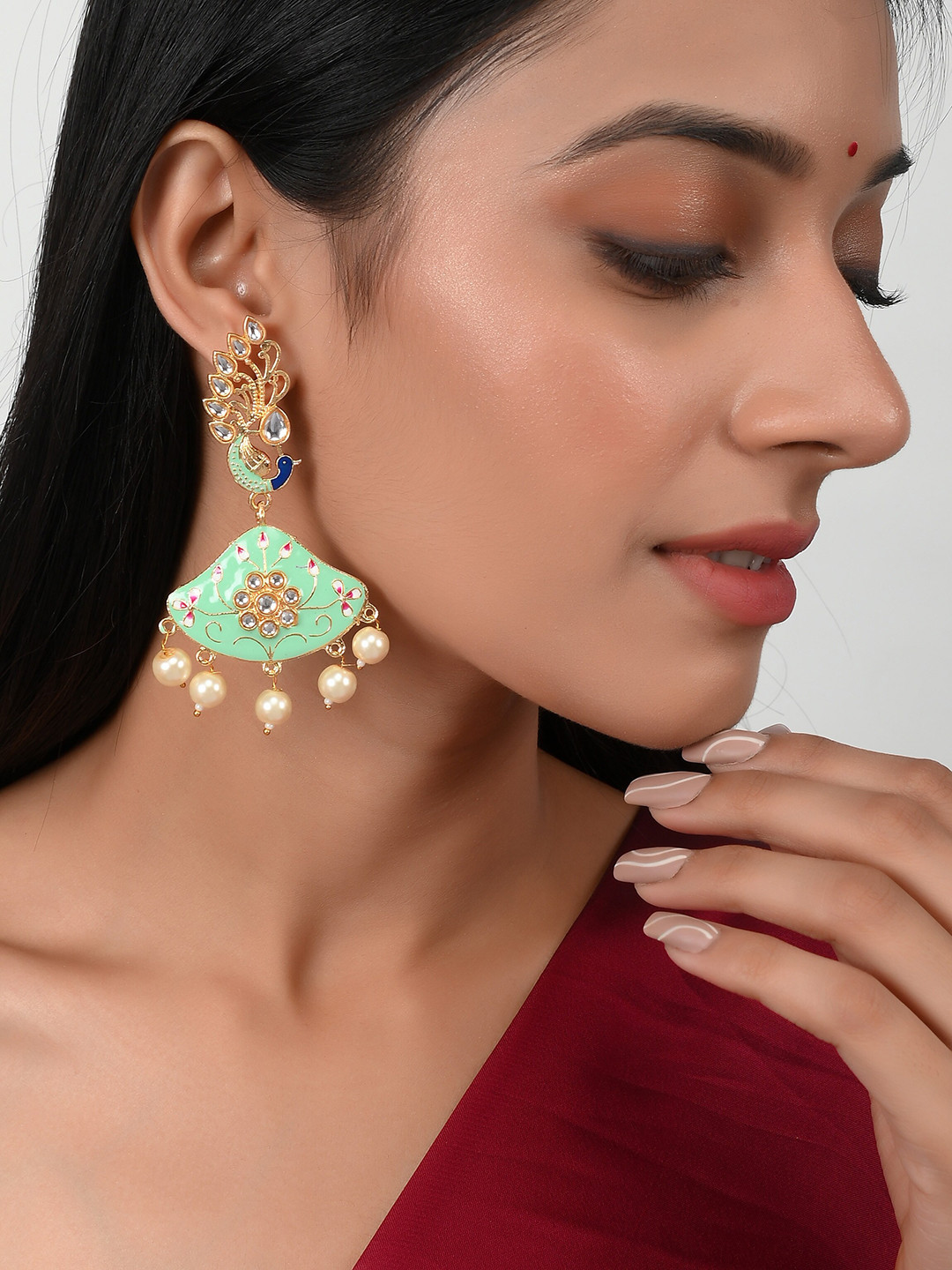 

Silvermerc Designs Green Peacock Shaped Drop Earrings