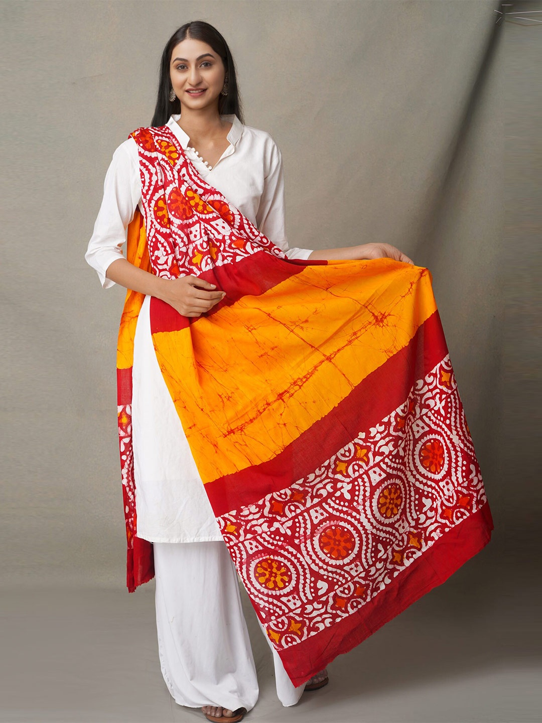 

Unnati Silks Orange & Red Ethnic Motifs Printed Pure Cotton Batik Dupatta