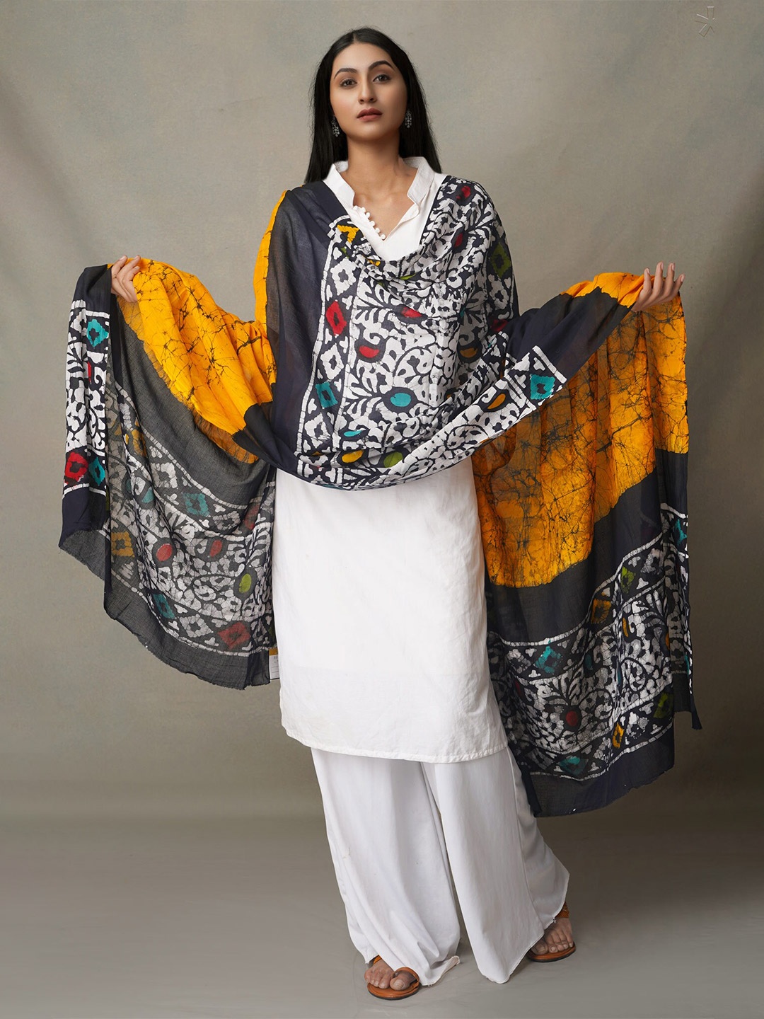 

Unnati Silks Yellow & Grey Ethnic Motifs Printed Pure Cotton Batik Dupatta