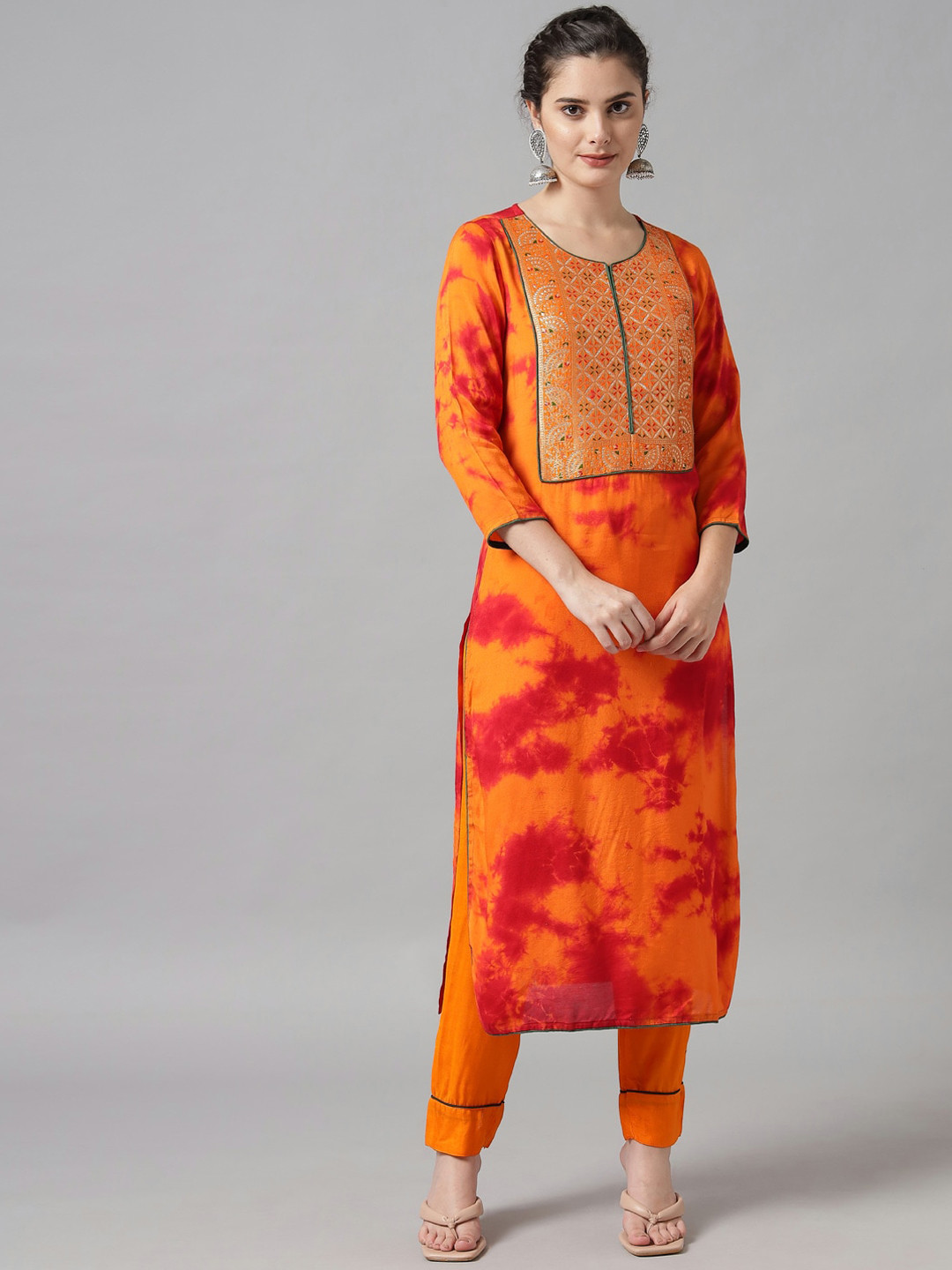 

Meeranshi Women Orange Printed Patchwork Kurta with Trousers