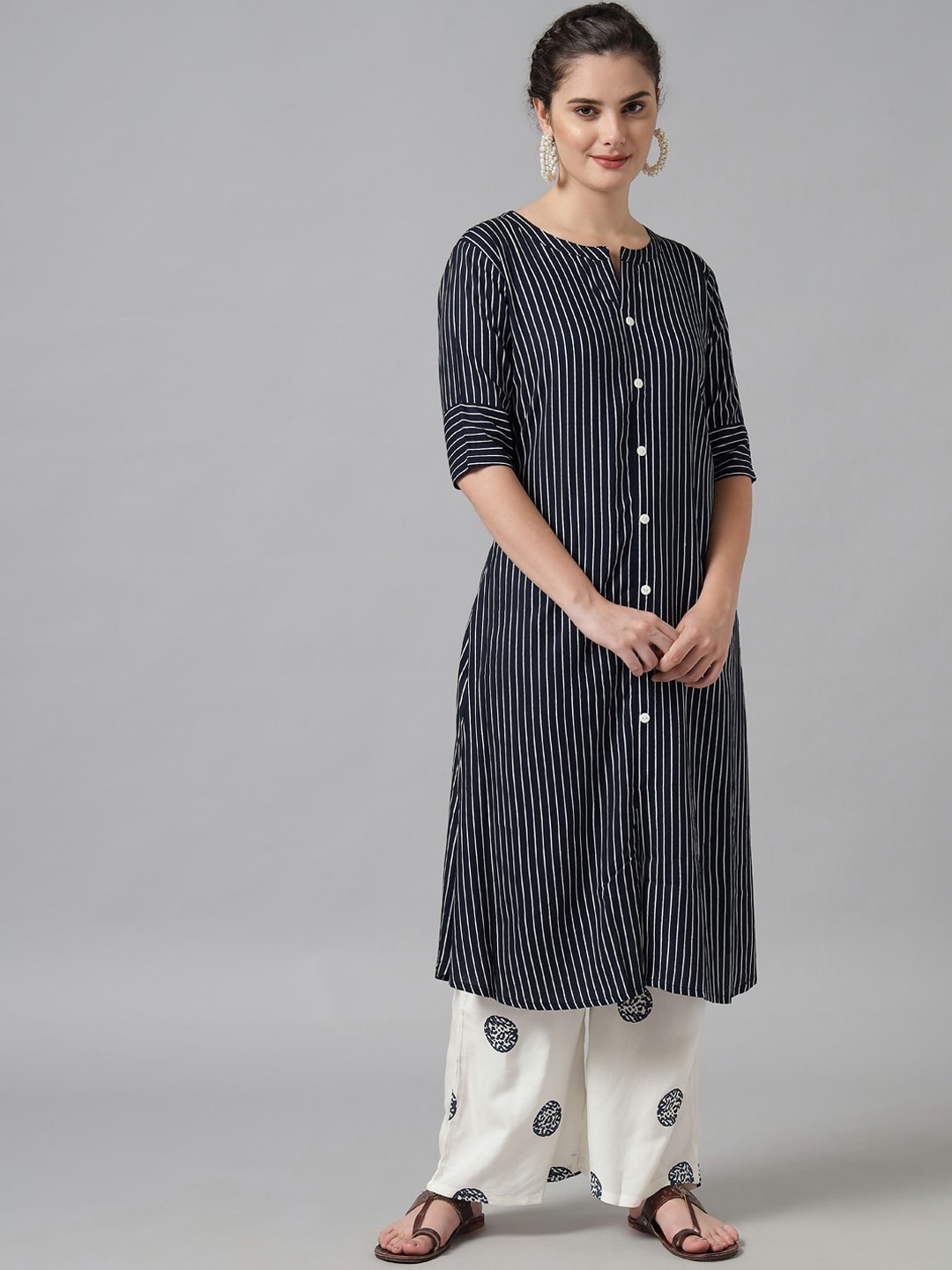 

Meeranshi Women Navy Blue Striped Pure Cotton Kurta with Palazzos