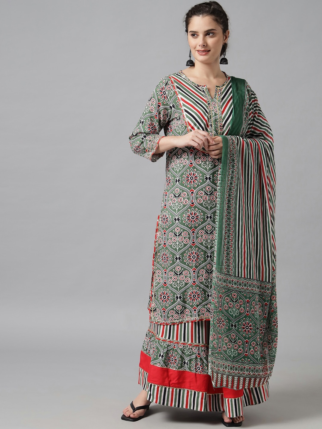 

Meeranshi Women Green Floral Printed Kurta with Skirt & With Dupatta