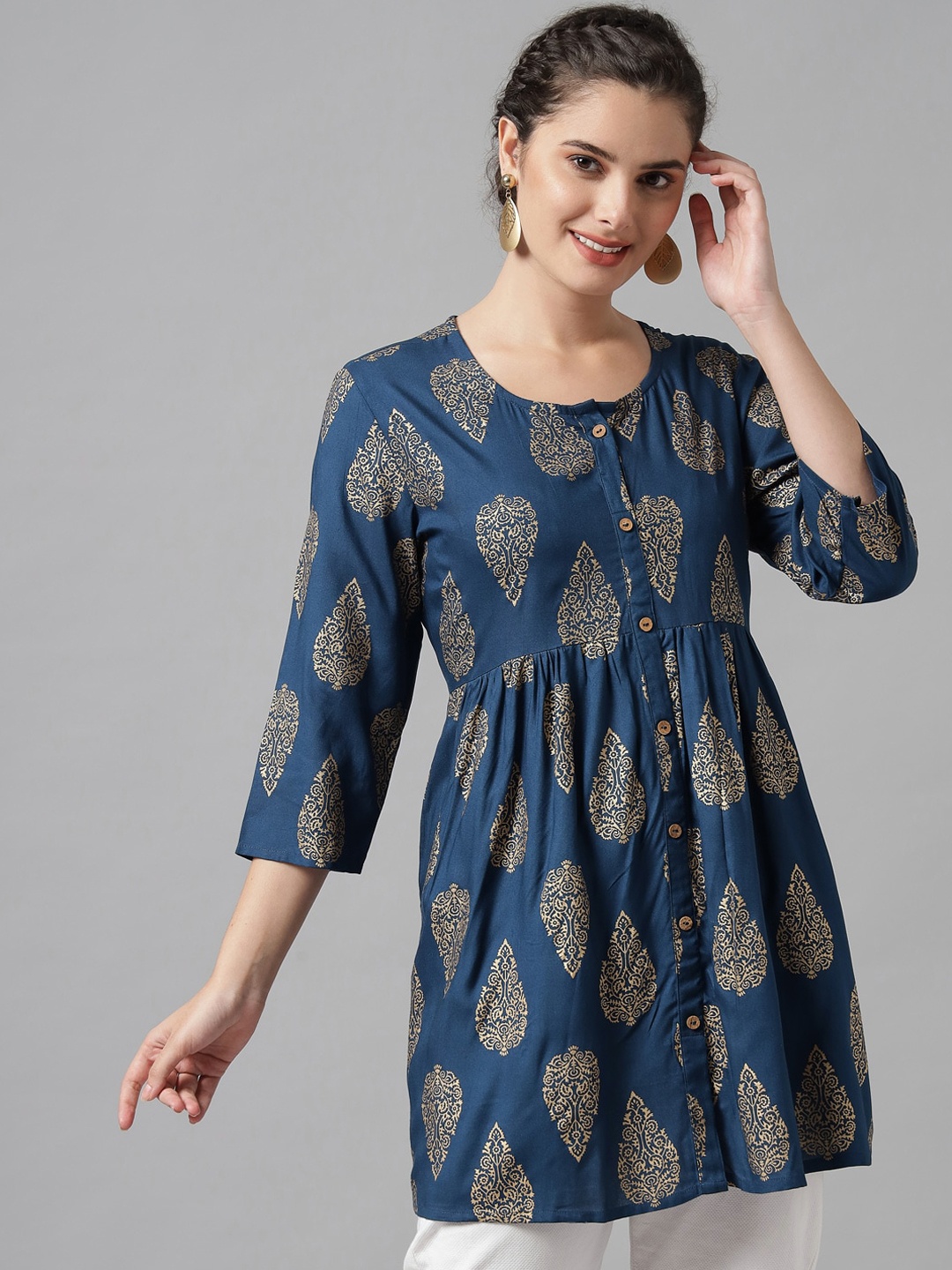 

Meeranshi Women Teal Paisley Printed Peplum Kurta