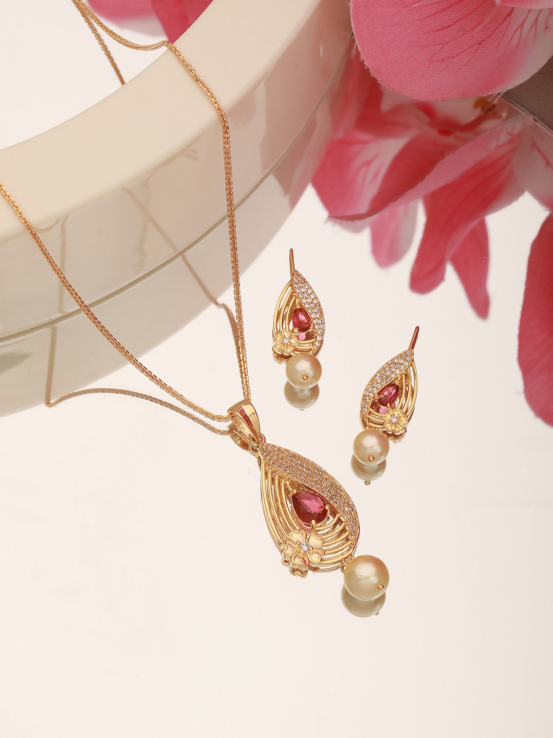 

Saraf RS Jewellery Gold-Plated Red Ruby Studded Jewellery Set