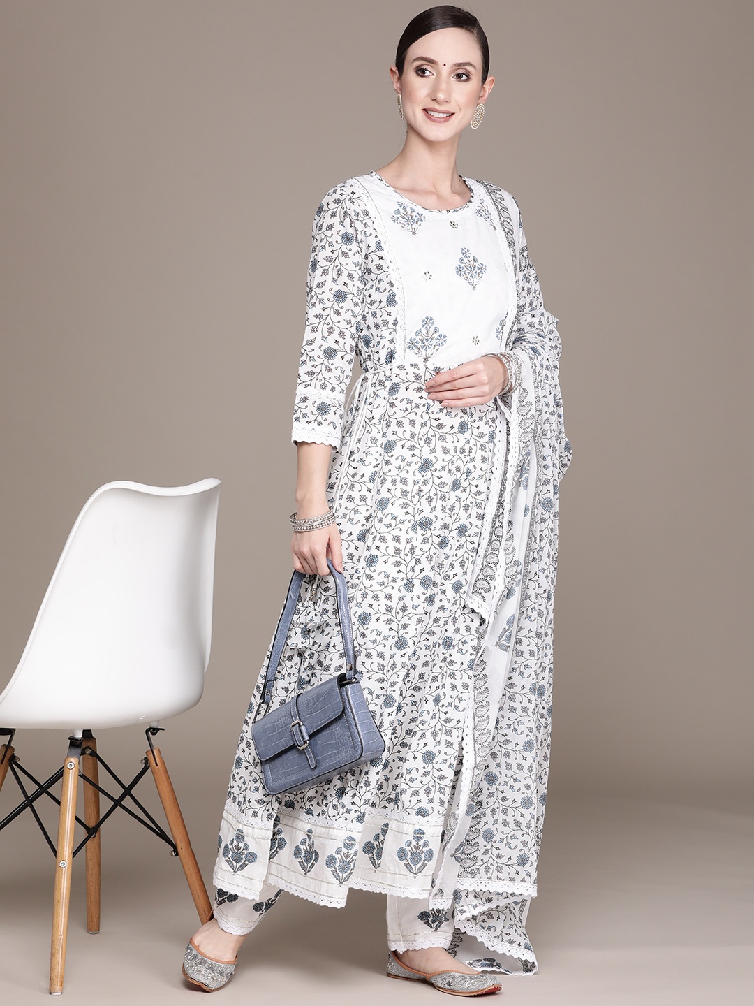

Ishin Women White Floral Yoke Design Beads and Stones Pure Cotton Kurta with Trousers & With Dupatta