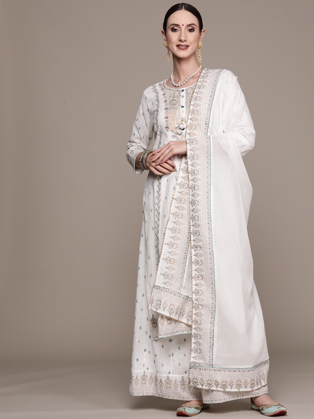 

Ishin Women Off White Floral Embroidered Beads and Stones Pure Cotton Kurta with Sharara & With Dupatta