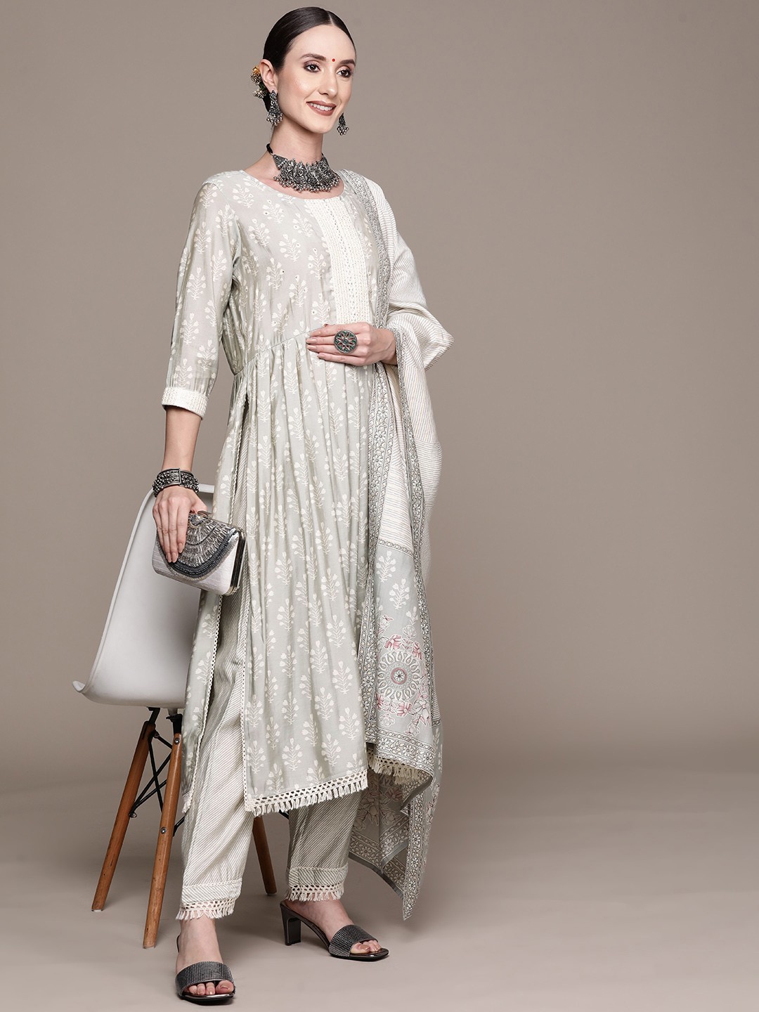 

Ishin Women Grey Floral Yoke Design High Slit Mirror Work Kurta with Trousers & With Dupatta