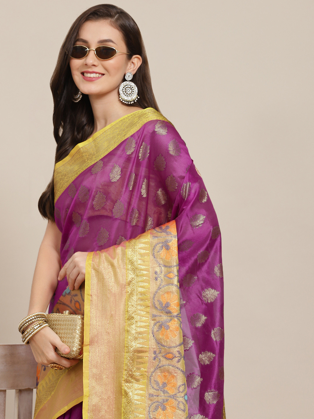 

Silk Land Purple & Yellow Ethnic Motifs Zari Art Silk Banarasi Saree