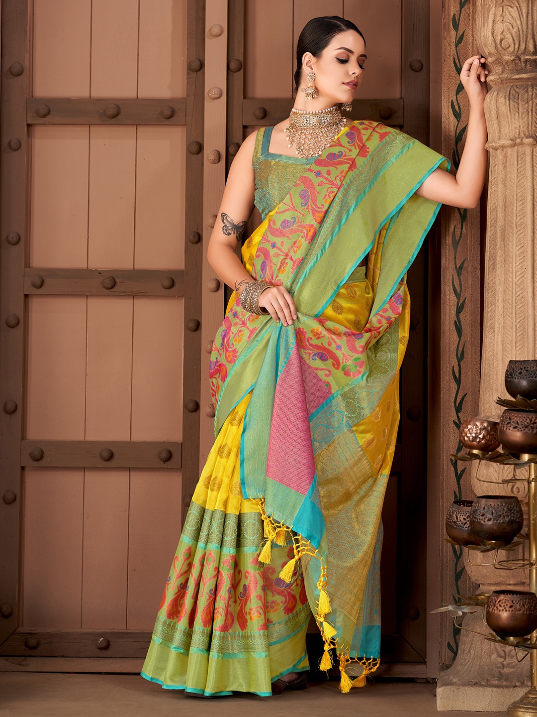 

Silk Land Yellow & Turquoise Blue Ethnic Motifs Zari Art Silk Banarasi Saree