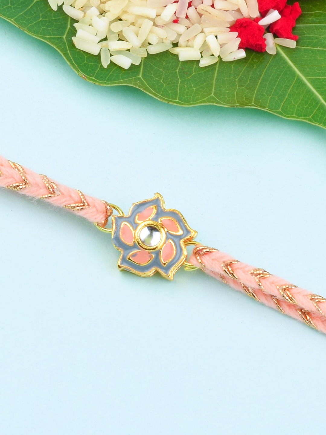 

Bigsmall Unisex Peach Coloured Threaded Designed Flower Metalic Rakhi