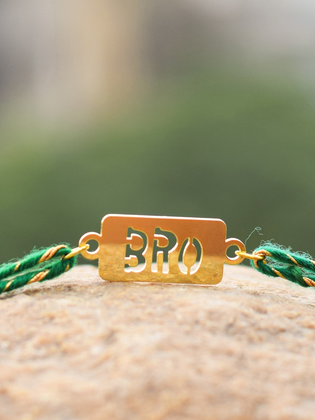 

Bigsmall Unisex Gold-Toned & Green Enamelled Bro-Charm Metallic Rakhi