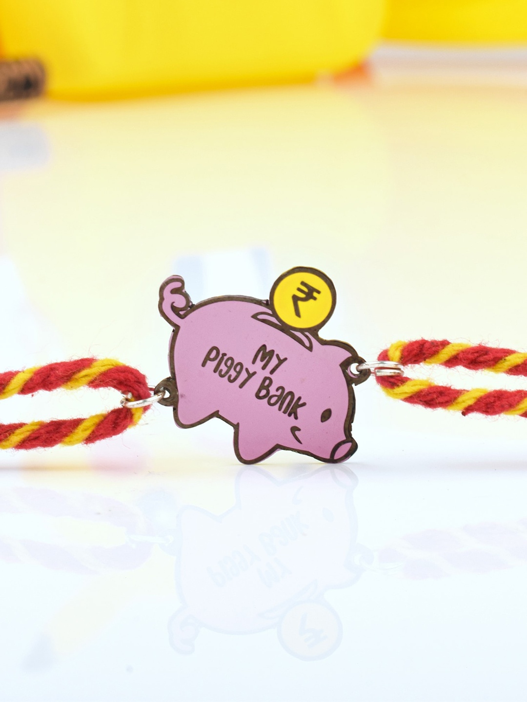 

Bigsmall Unisex Silver-Toned & Pink My Piggy Beaded Metallic Red Rakhi