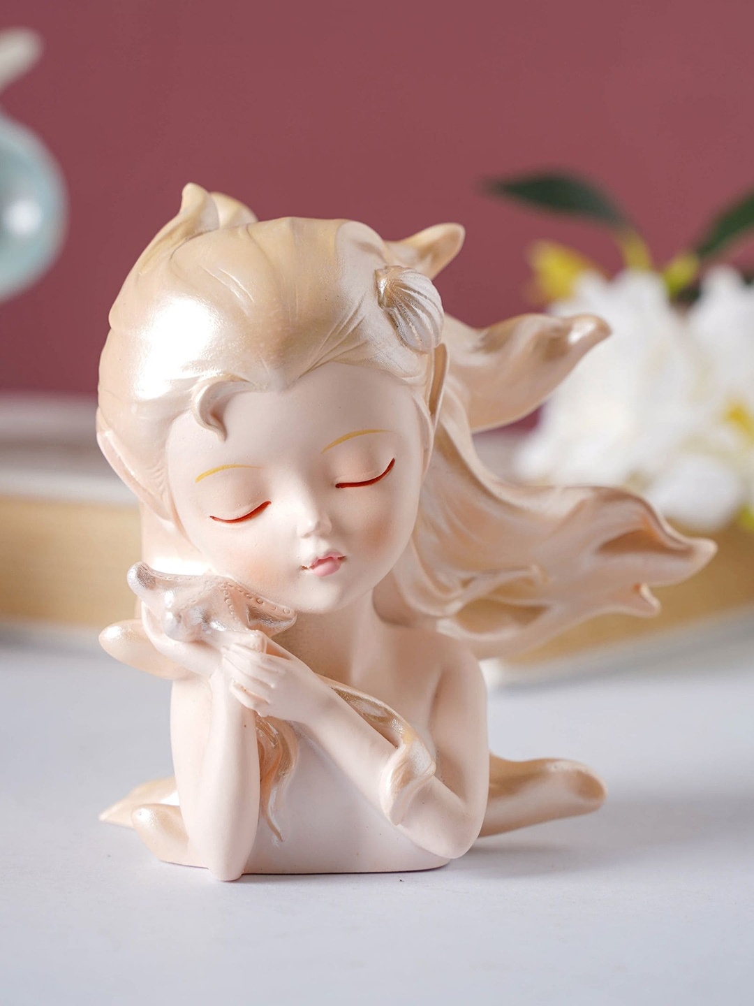 

Nestasia Beige Textured Oceanic Life Decor Showpiece