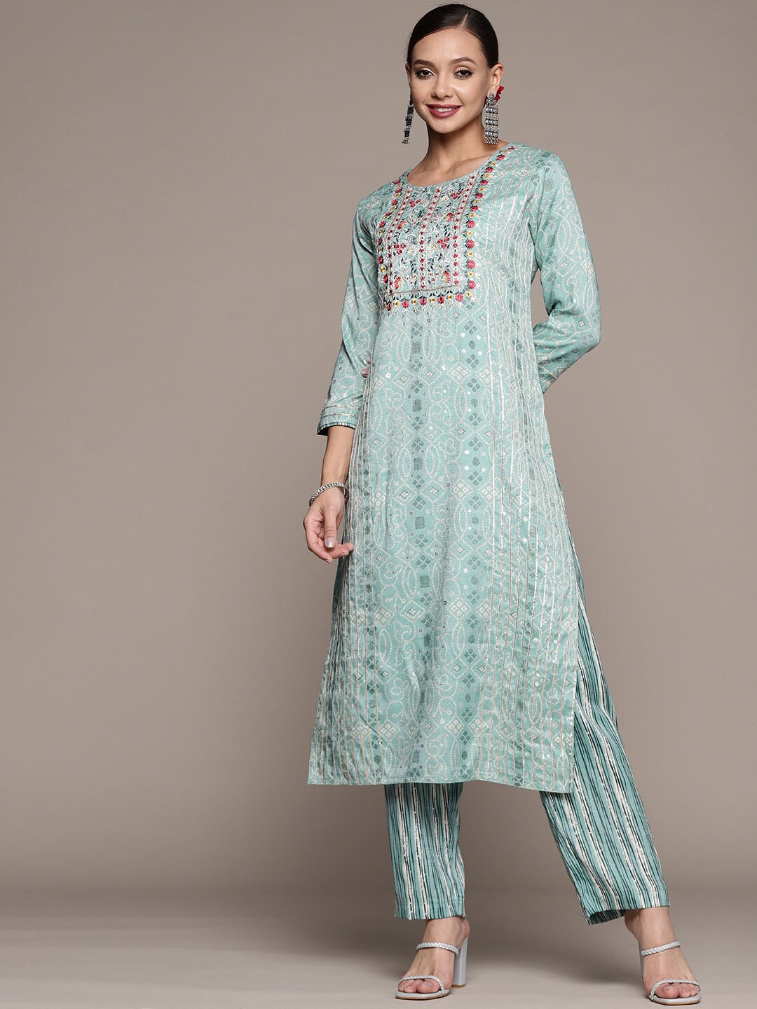 

Anubhutee Women Blue Ethnic Motifs Panelled Thread Work Kurta with Palazzos