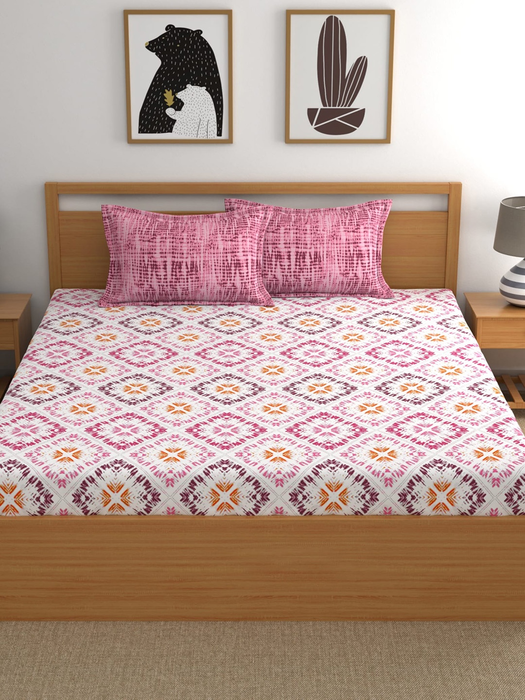 

Dreamscape Pink & Orange Geometric 140 TC Queen Bedsheet with 2 Pillow Covers