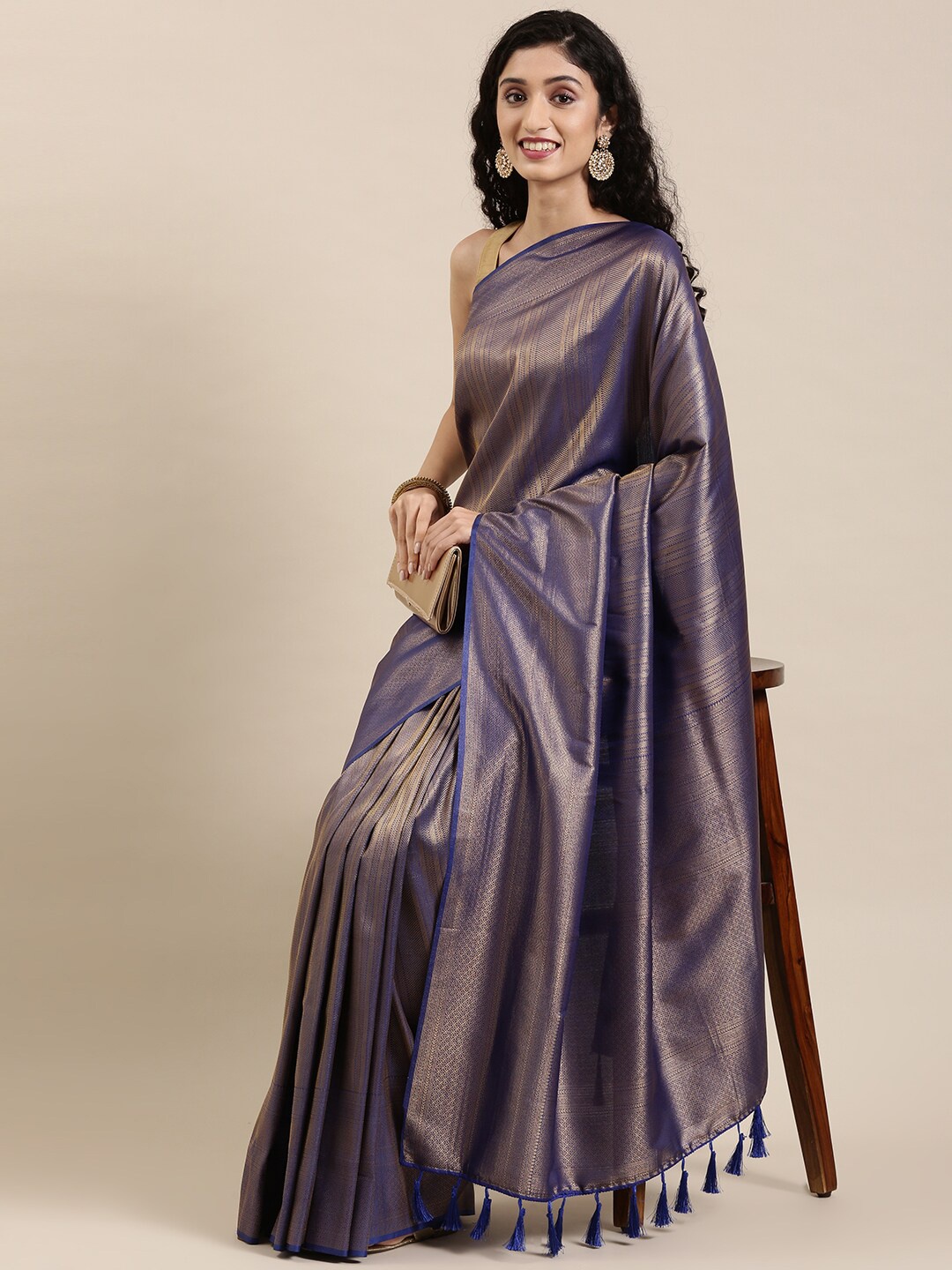 

The Chennai Silks Blue Ethnic Motifs Zari Art Silk Saree