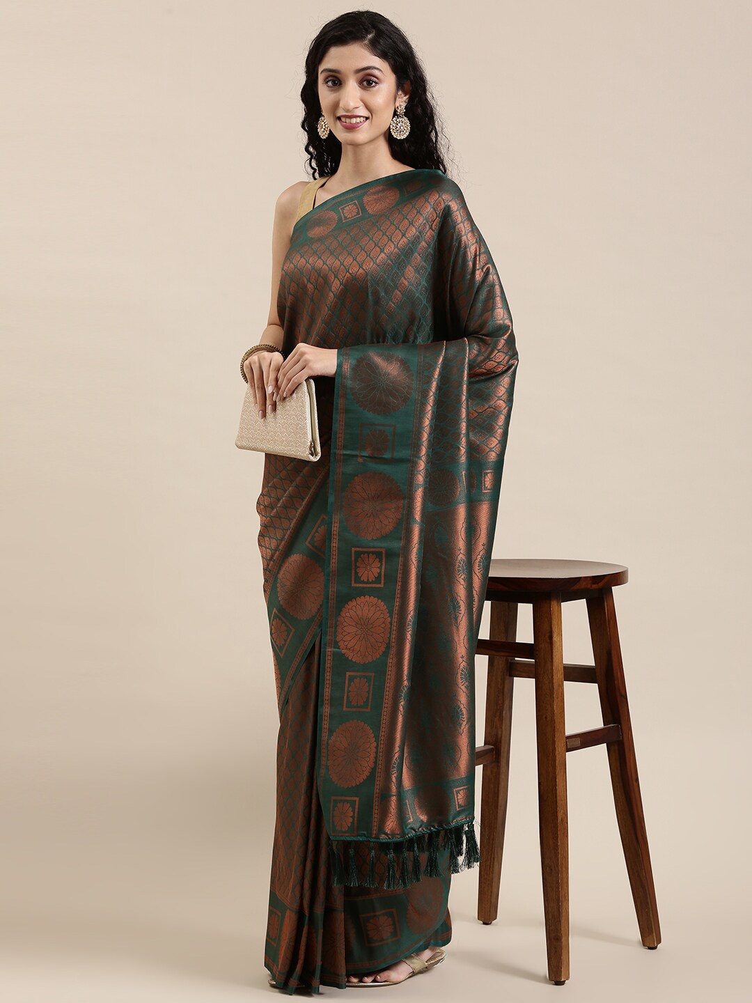 

The Chennai Silks Green & Copper-Toned Woven Design Zari Art Silk Saree