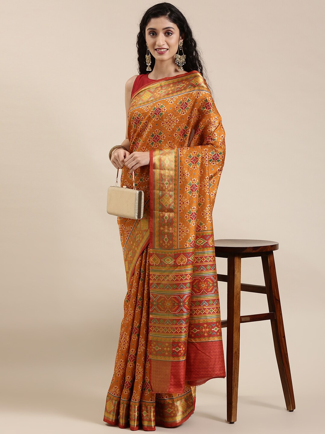 

The Chennai Silks Orange & Green Printed Saree