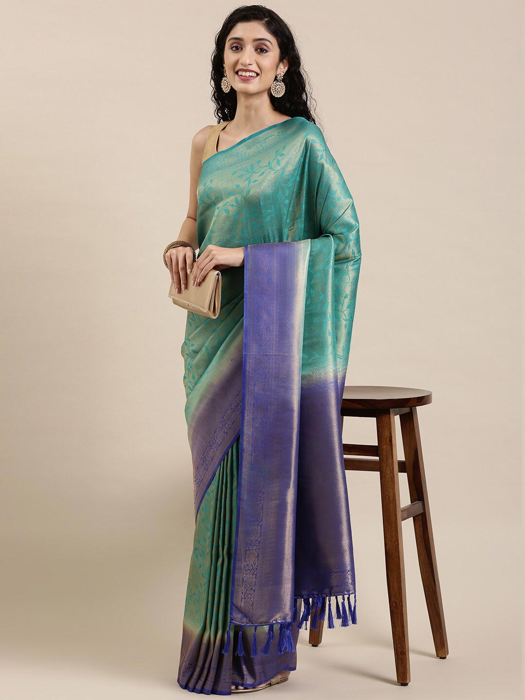 

The Chennai Silks Blue & Gold-Toned Floral Zari Art Silk Saree