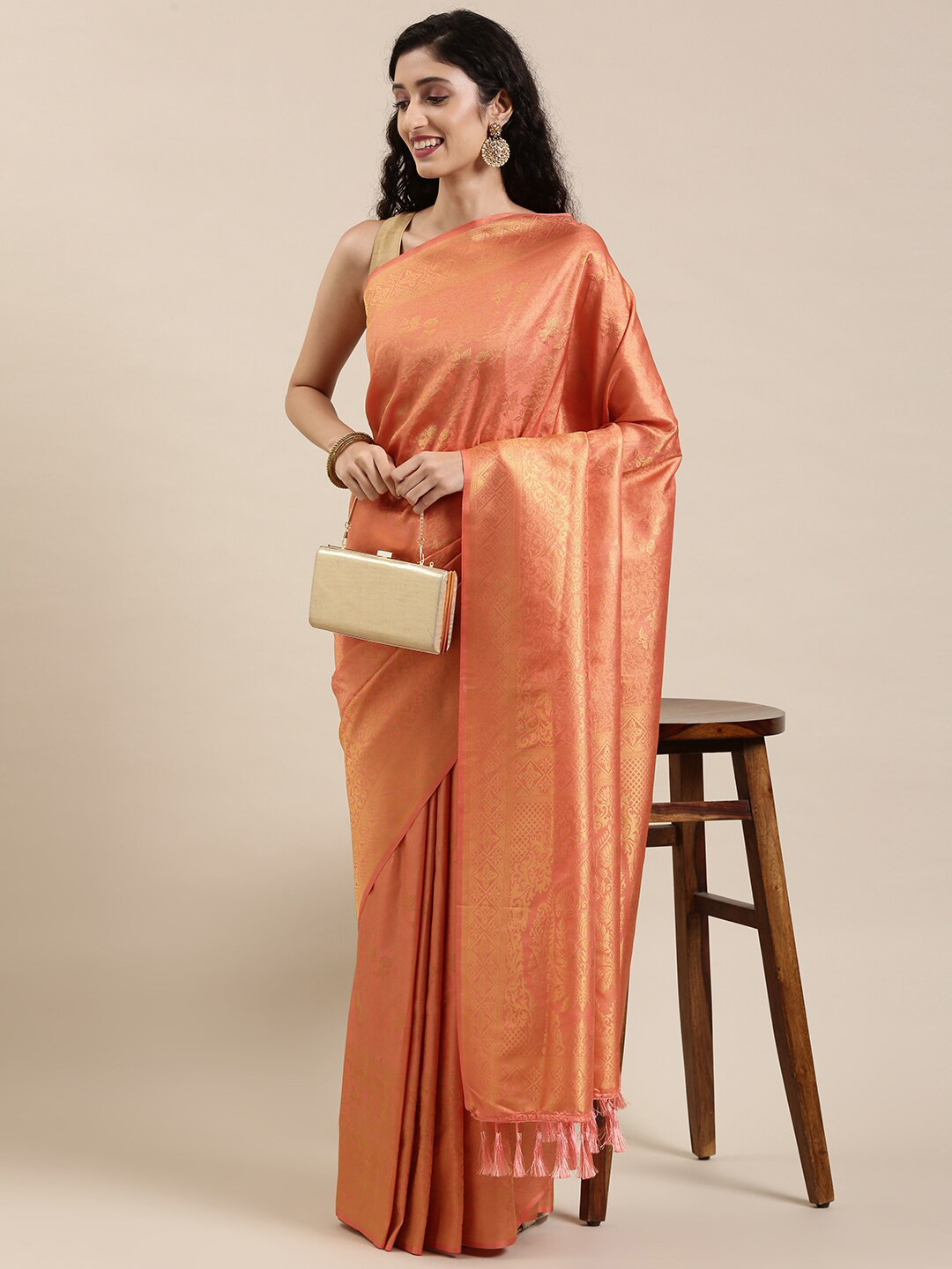 

The Chennai Silks Orange & Gold-Toned Floral Zari Art Silk Saree