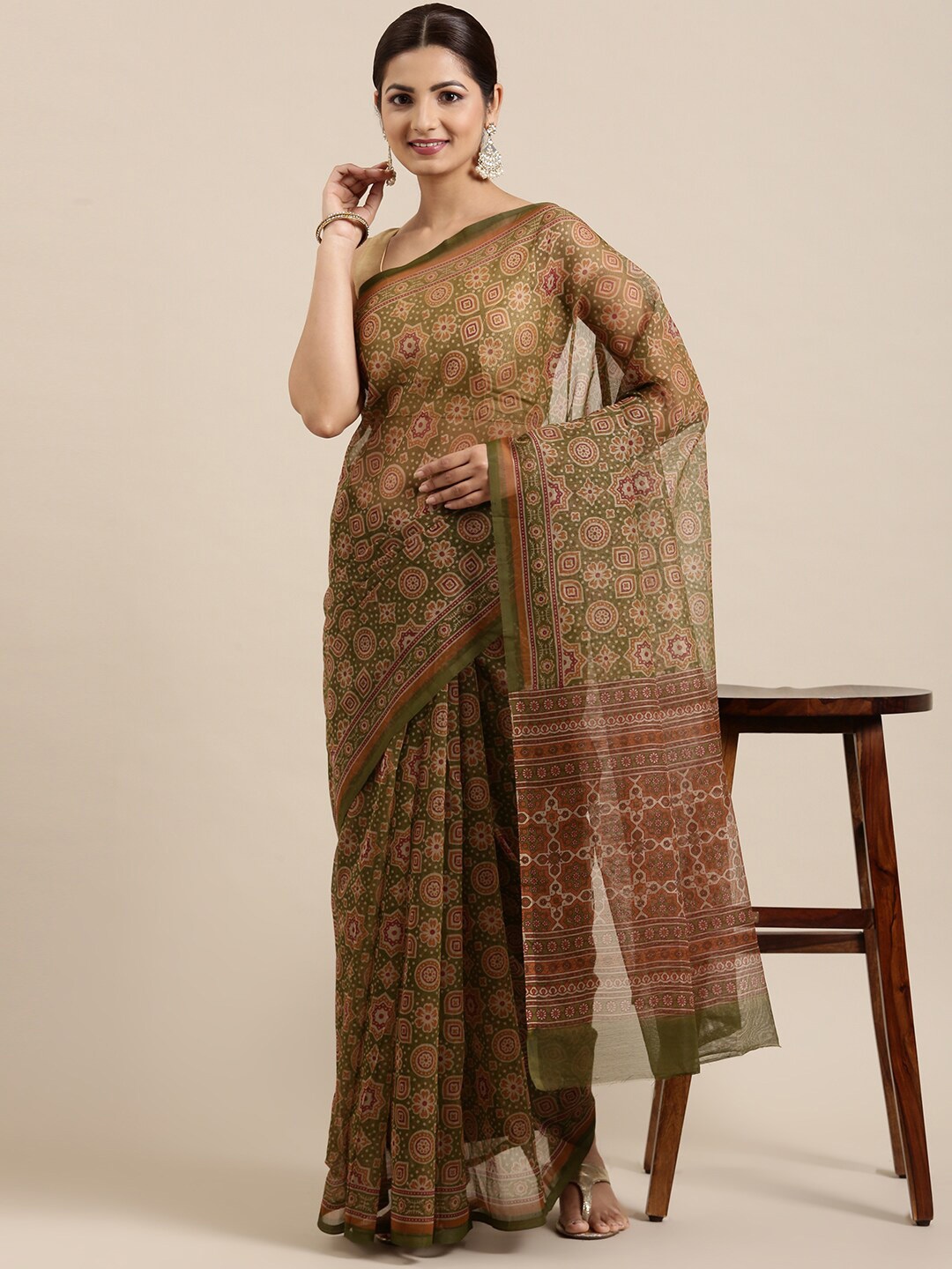 

The Chennai Silks Green & Brown Zari Supernet Kota Saree